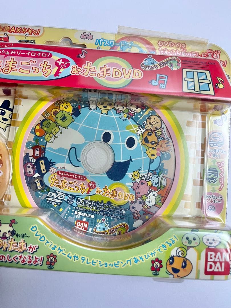 【新品未開封】たまごっち + たまDVD ふぁみりーイロイロ 希少　オレンジ