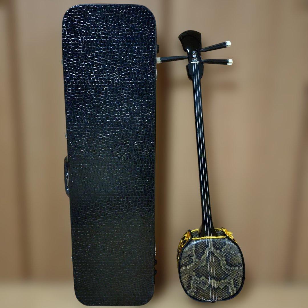 沖縄三線 本蛇皮 強化張 真壁型 爪付 ハードケース付 ウマ（駒）付